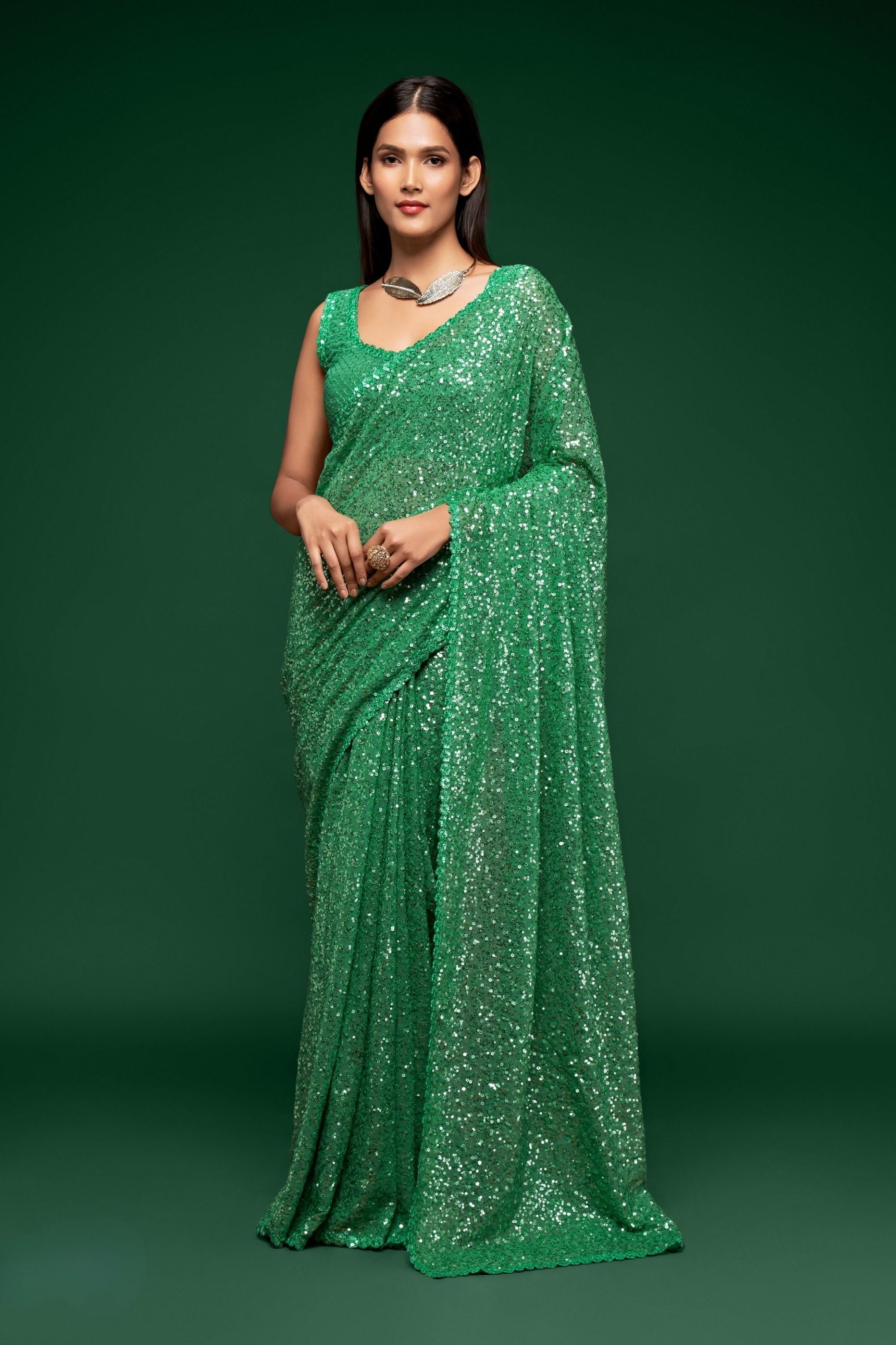 Green Sequins Embroidered Saree In Georgette