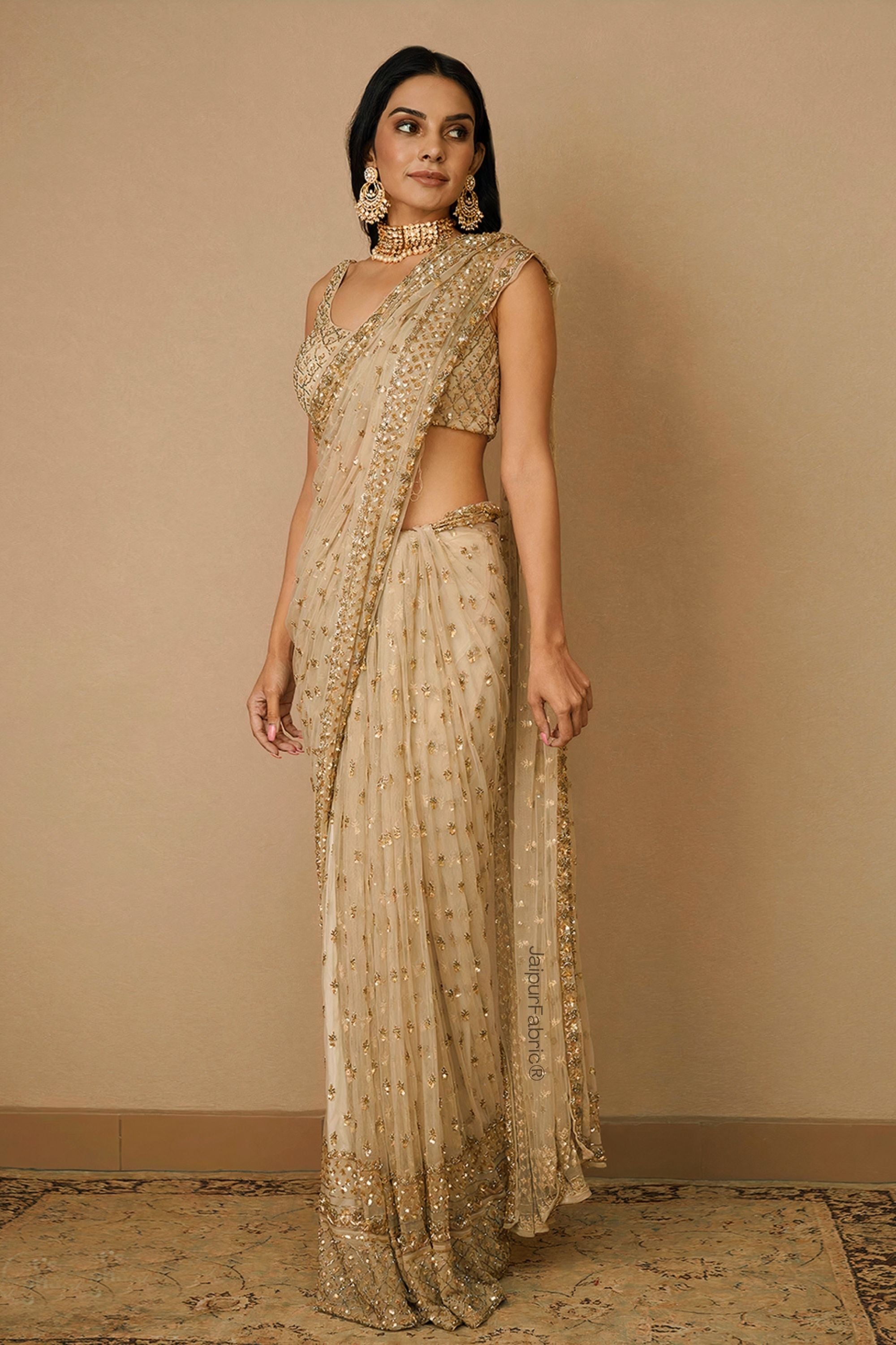 Beige Sequins Embellished Net Saree