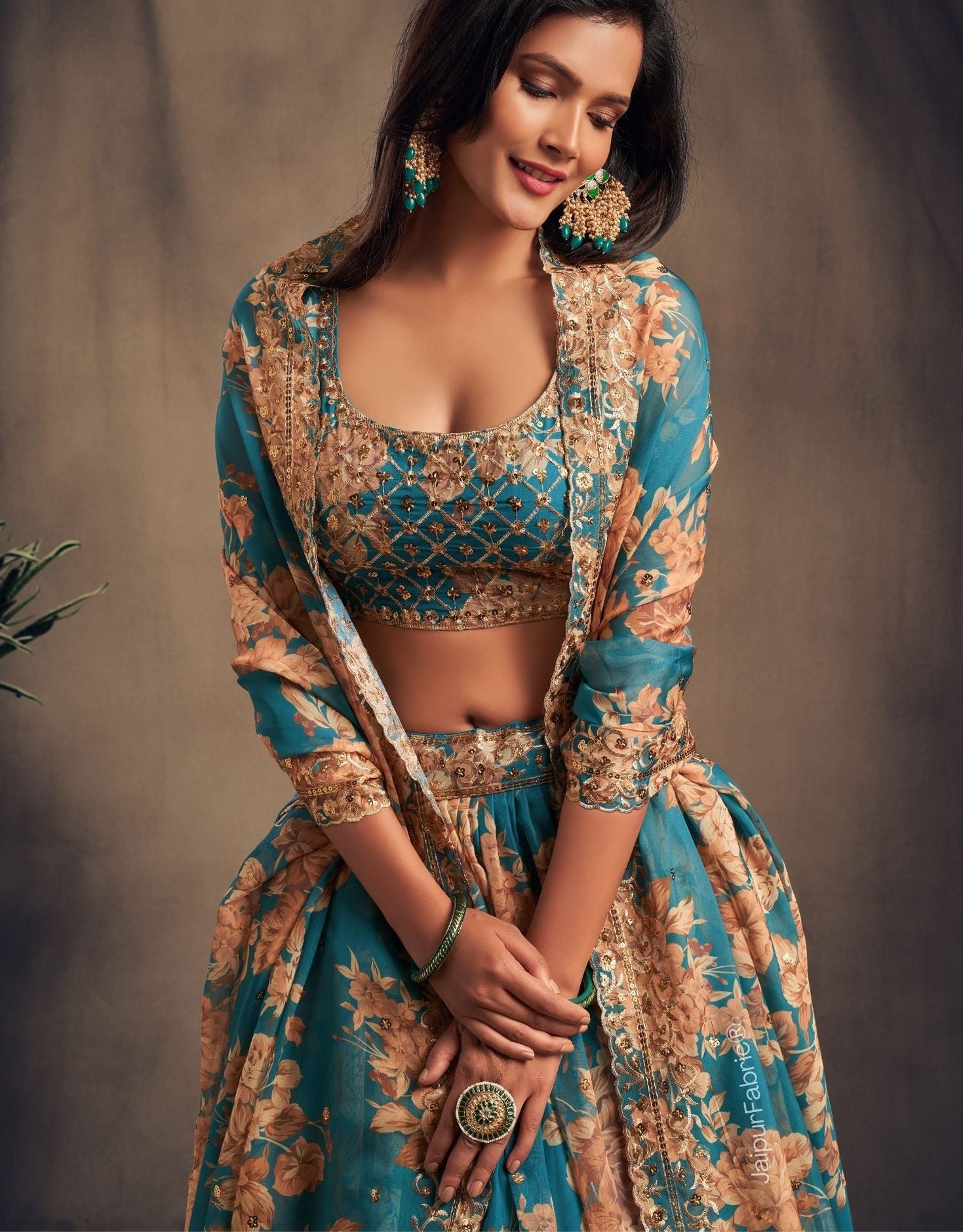 Radiant Flower Printed Teal Blue Organza Lehenga Choli